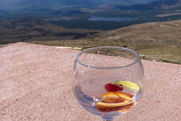 Gin and a view of the Cairgorms at the Ptarmigan restaurant on  Cairn Gorm. 