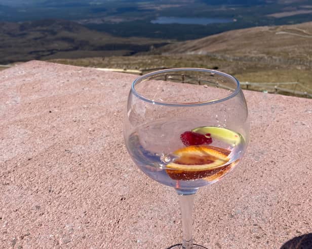 Gin and a view of the Cairgorms at the Ptarmigan restaurant on  Cairn Gorm. 