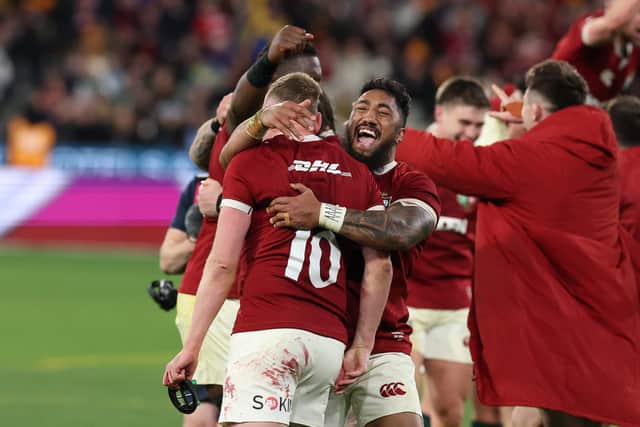 Bundee Aki and Finn Russell celebrate the British & Irish Lions' win over Australia in the second Test which clinched the series.