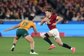 Blair Kinghorn of the British & Irish Lions takes on Joseph-Aukuso Suaalii of Australia during the second Test win in Melbourne.