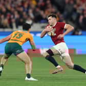Blair Kinghorn of the British & Irish Lions takes on Joseph-Aukuso Suaalii of Australia during the second Test win in Melbourne.