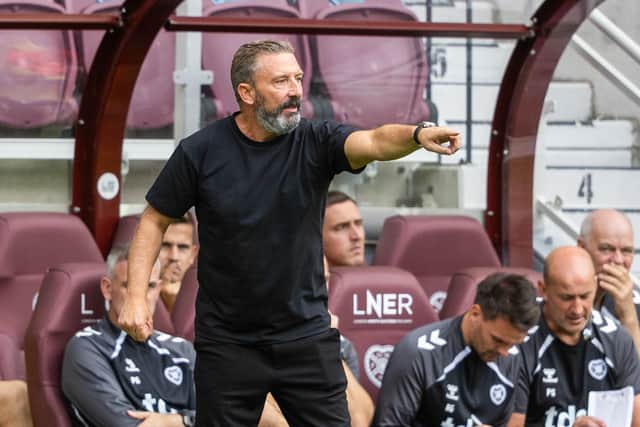 Derek McInnes is in the Hearts home dugout.