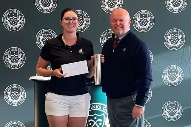 Southerness player Ailsa Brannock pictured with club captain Richard Phillips after winning the inaugural Bruntsfield Links Golfing Society’s Women’s Open