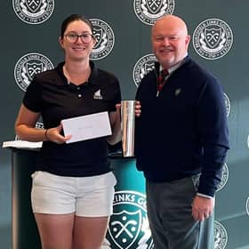 Southerness player Ailsa Brannock pictured with club captain Richard Phillips after winning the inaugural Bruntsfield Links Golfing Society’s Women’s Open