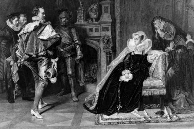 The death warrant of Mary Queen of Scots (1542 - 1587), authorised by Elizabeth I, is brought to her in her prison on February 1, 1587.