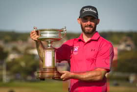 Murcar Links member Chris Somers shows off the trophy after winning the Scottish Amateur Championship at Gullane 
