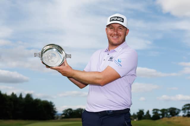 Daniel Young shows off the trophy after winning the Farmfoods Scottish Challenge on day four of the Farmfoods Scottish Challenge supported by The R&A at Schloss  Roxburghe in Kelso