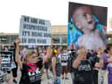 Israeli activists protest in Tel Aviv about the ongoing food shortages in the Gaza Strip (Picture: Jack Guez)