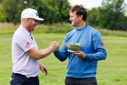 Daniel Young is congratulated by Michael MacDougall of Paul Lawrie’s 5 Star Sports Agency after winning the Farmfoods Scottish Challenge supported by The R&A at Schloss Roxburghe 