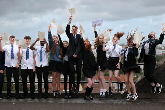 Pupils pose after receiving exam results at Kings Park Secondary School in Glasgow. Picture: Jeff J Mitchell/Getty Images