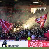 Aberdeen fans let off pyro during the match against Celtic in May.