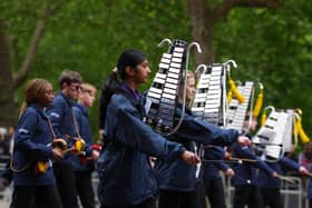 Musicians from Girls' Brigade parade march. Picture: PA