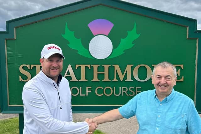 Chris Curris congratuled on his win by Strathmore Golf Centre owner Dave Norman