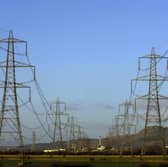The first question should not be about paying compensation to those living near pylons but whether they are necessary in the first place (Picture: Jeff J Mitchell)