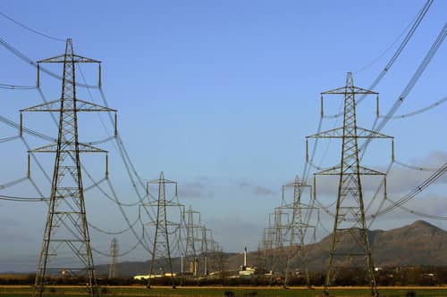 The first question should not be about paying compensation to those living near pylons but whether they are necessary in the first place (Picture: Jeff J Mitchell)