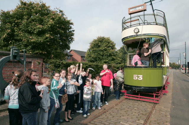 Passengers boarding a tram at Summerlee
