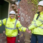 Second World War veteran Dorothea Barron, 100, places a brick at a new housing development at the site of the former Port Edgar barracks in South Queenferry (Picture: Jane Barlow)