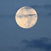 A sturgeon super moon sets in Las Vegas, Nevada, in 2023