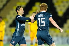 Yan Dhanda and Simon Murray teamed up at Ross County - and now they'll be teammates at Dundee.