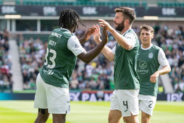 Grant Hanley celebrates with Rocky Bushiri during the 2-2 draw with Kilmarnock.