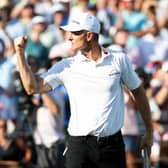 Justin Rose reacts after making a birdie on the 18th hole during his play-off against J.J. Spaun in the FedEx St. Jude Championship 2025 at TPC Southwind in Memphis