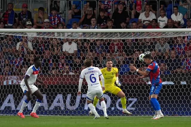 Rangers goalkeeper Jack Butland is beaten by a header from Svetozar Markovic of Viktoria Plzen.