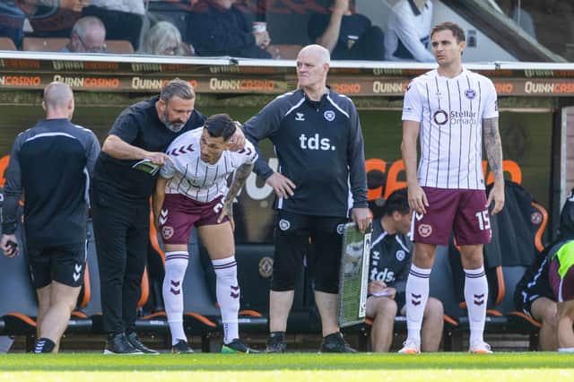 Hearts head coach Derek McInnes with Alexandros Kyziridis and Michael Steinwender - two players recruited with the help of Jamestown Analytics. (Photo by Mark Scates / SNS Group)