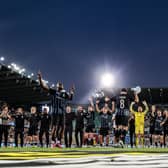 Club Brugge players celebrate after defeatin RB Salzburg in the Champions League third qualifying round. (Photo by BRUNO FAHY/Belga/AFP via Getty Images)          