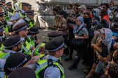 Police and protesters confront each other during a demonstration in support of Palestine Action outside the High Court in London (Picture: Dan Kitwood)