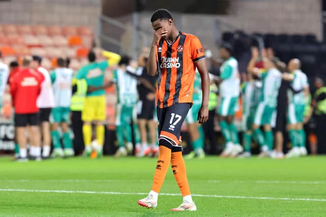 Dundee United's Amar Fatah looks dejected following defeat in the penalty shoot-out to Rapid Vienna.