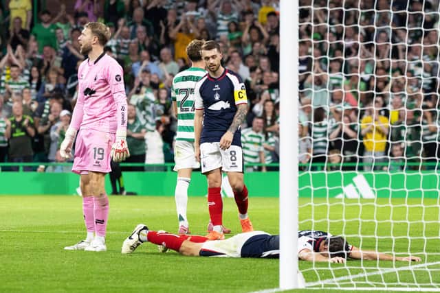 Falkirk's Liam Henderson is dejected after scoring an own goal against Celtic in the Premier Sports Cup.  (Photo by Ross Parker / SNS Group)