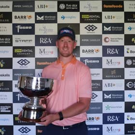 Greg Dalziel shows off the trophy after winning the Leven Links Classic presented by The MacKay Clinic