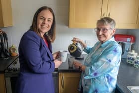 Muriel Allison with Kate Forbes as she becomes the first resident in the world to install the Kight PowerHub battery storage energy system  