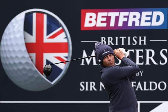 Feeling the cold on a chilly morning in the Midlands, Matt Fitzpatrick tees off on the 11th hole at The Belfry