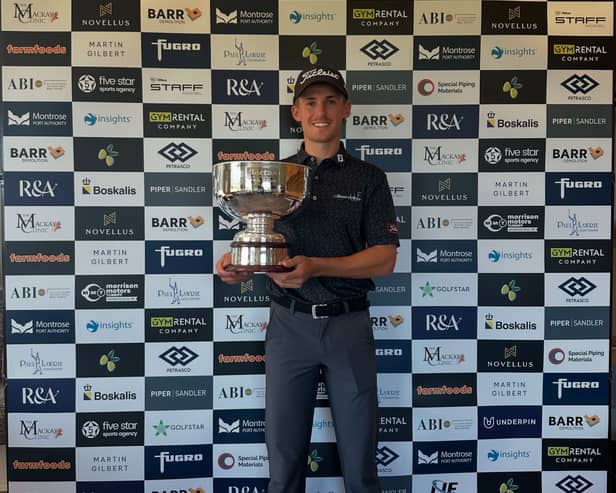 Connor McKinney shows off the trophy after his win in Musselburgh Masters presented by Alistair Brown International