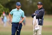 Sam Bairstow with his caddie on day two of the Betfred British Masters hosted by Sir Nick Faldo at The Belfry on Friday