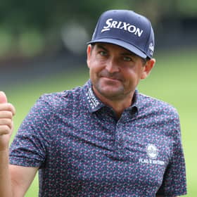 Keegan Bradley reacts on the 18th green during the third round of the Tour Championship at East Lake Golf Club in Atlanta
