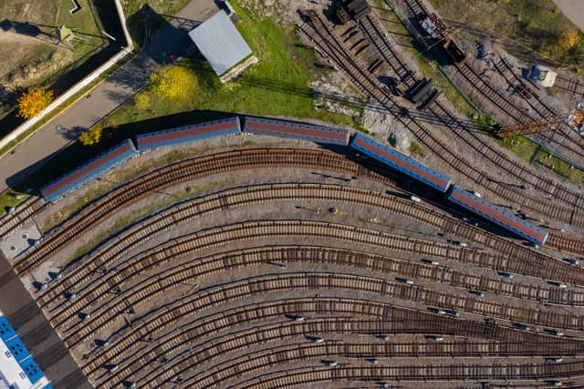 An aerial view of a train arriving at a station in Kyiv, Ukraine.