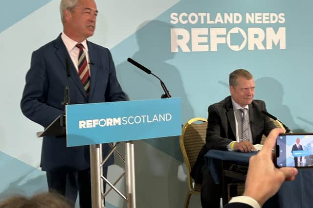 Reform UK leader alongside new party MSP and former Scottish Tory Graham Simpson.