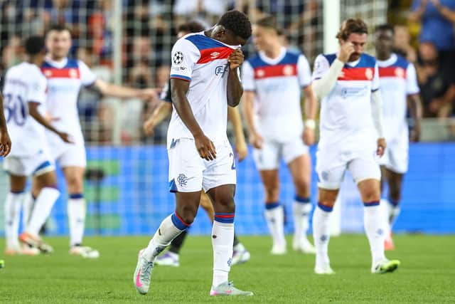 Rangers players look dejected during the Champions League play-off defeat to Club Brugge at the Jan Breydel Stadium.
