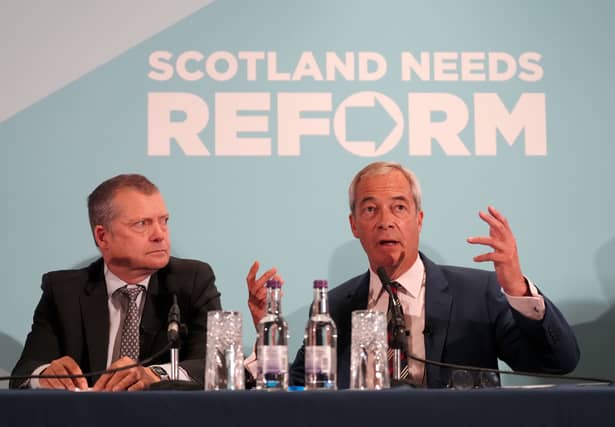 Reform UK leader Nigel Farage, right, and MSP Graham Simpson at a press conference to announce Mr Simpson's defection to Reform on Wednesday