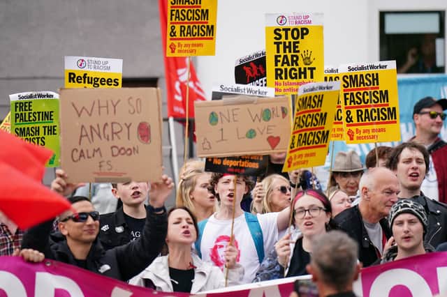 The Stand Up To Racism counter protest outside the Cladhan Hotel in Falkirk on Saturday.
