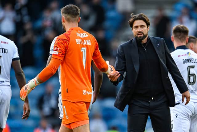 Rangers goalkeeper Jack Butland and head coach Russell Martin.