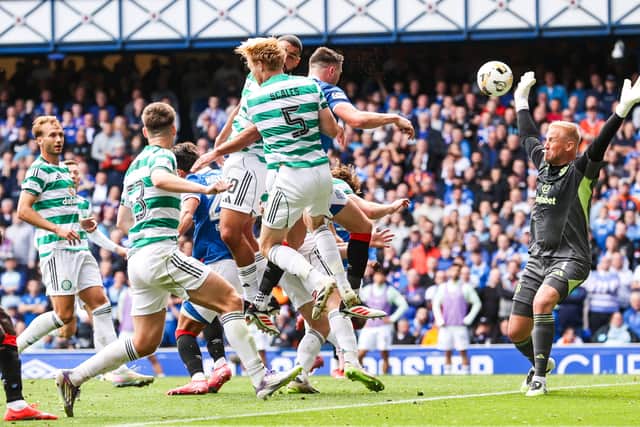 Rangers' John Souttar (centre) heads past Celtic goalkeeper Kasper Schmeichel but the goal was ruled out for offside following a VAR check. (Photo by Craig Williamson / SNS Group)
