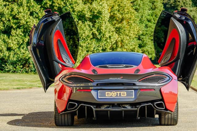 Dihedral doors add a serious dose of theatre to the car