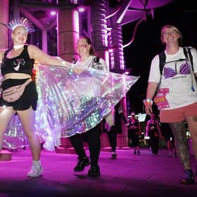 This walker sported a shimmering cape and matching head band for the charity walk 