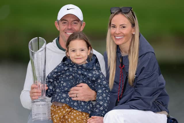 Rory McIlroy shows off the Amgen Irish Open trophy with his daughter, Poppy, and wife, Erica Stroll, at The K Club 