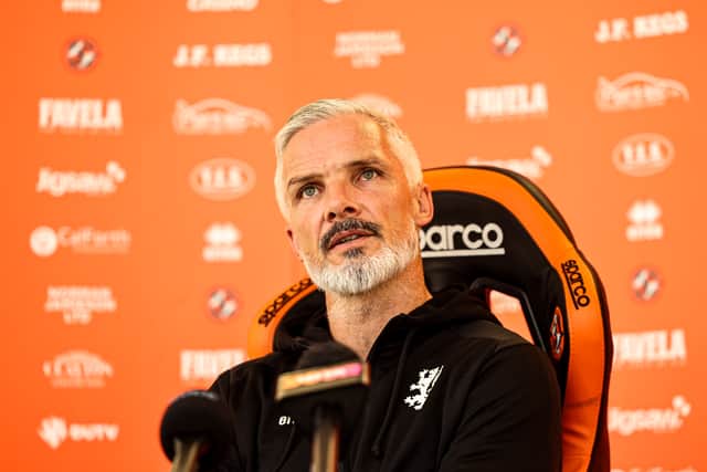 Jim Goodwin has penned a new contract with Dundee United.