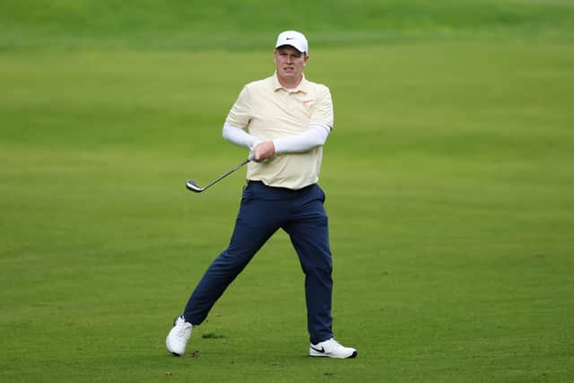 Bob MacIntyre plays his second shot on the 13th hole on day one of the BMW PGA Championship at Wentworth Golf Club