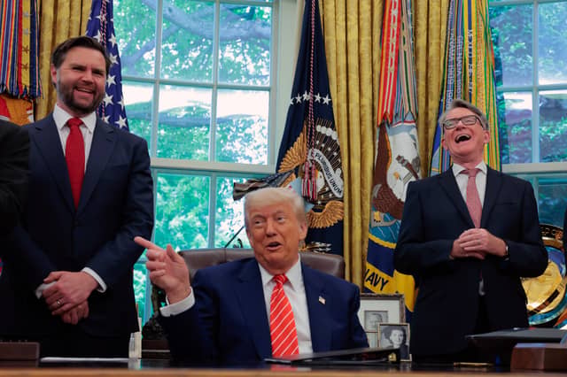 Peter Mandelson, right, and JD Vance laugh as Donald Trump makes a point in the Oval Office of the White House (Picture: Anna Moneymaker)